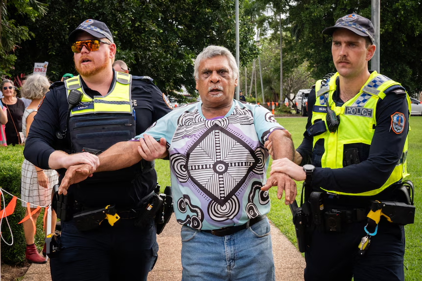 Protest arrest overshadows NT Administrator swearing-in as controversy over past posts continues